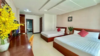 Dreibettzimmer mit Stadtblick — Gold hotel, Saigon